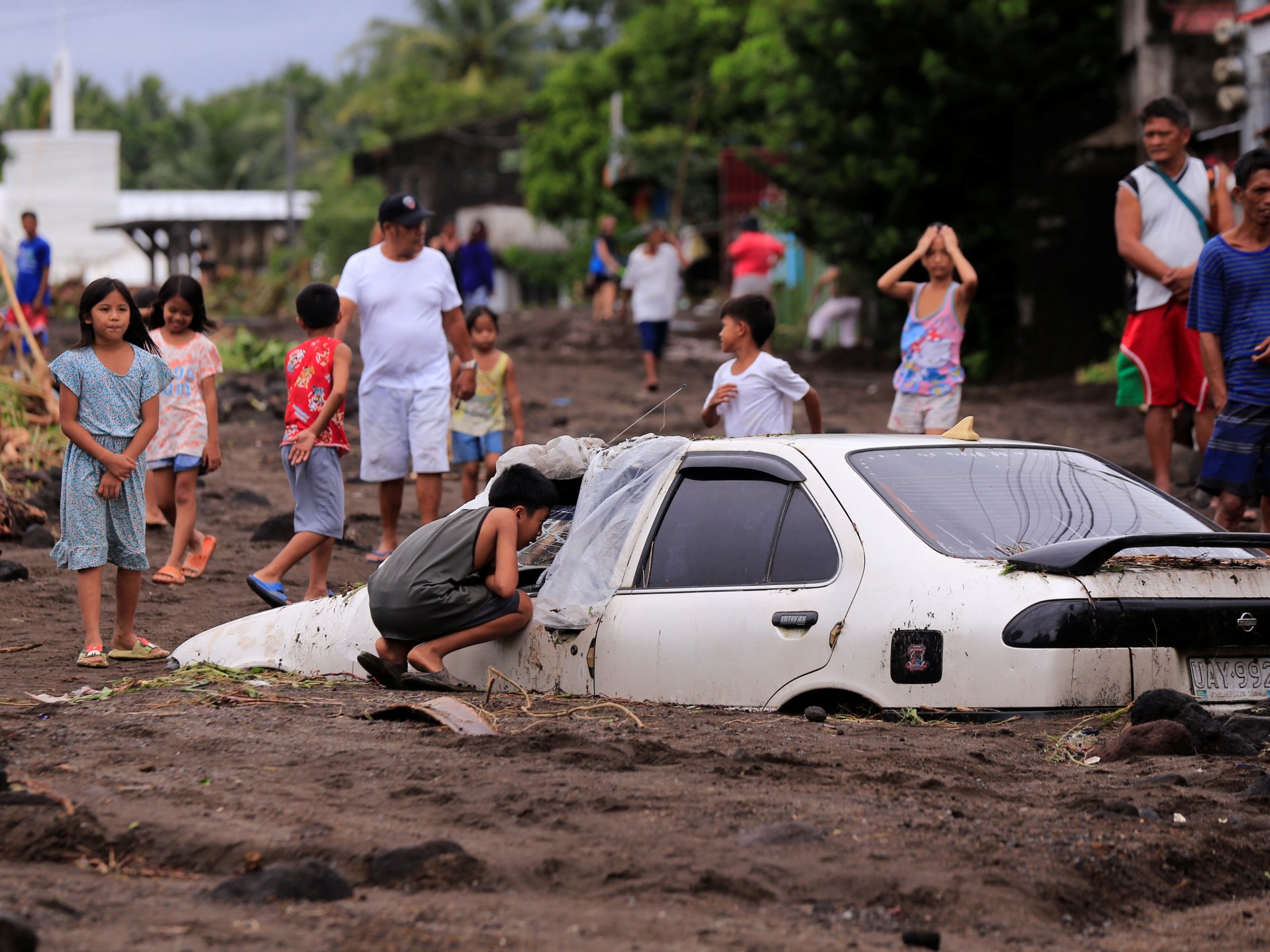 Photos: Thousands evacuated as tropical storm batters Philippines | Floods News