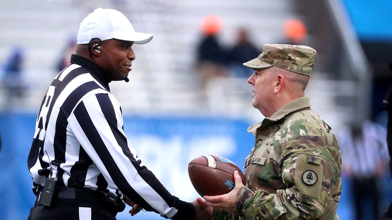 College football referee interrupts penalty call to salute military veterans during Celebration Bowl